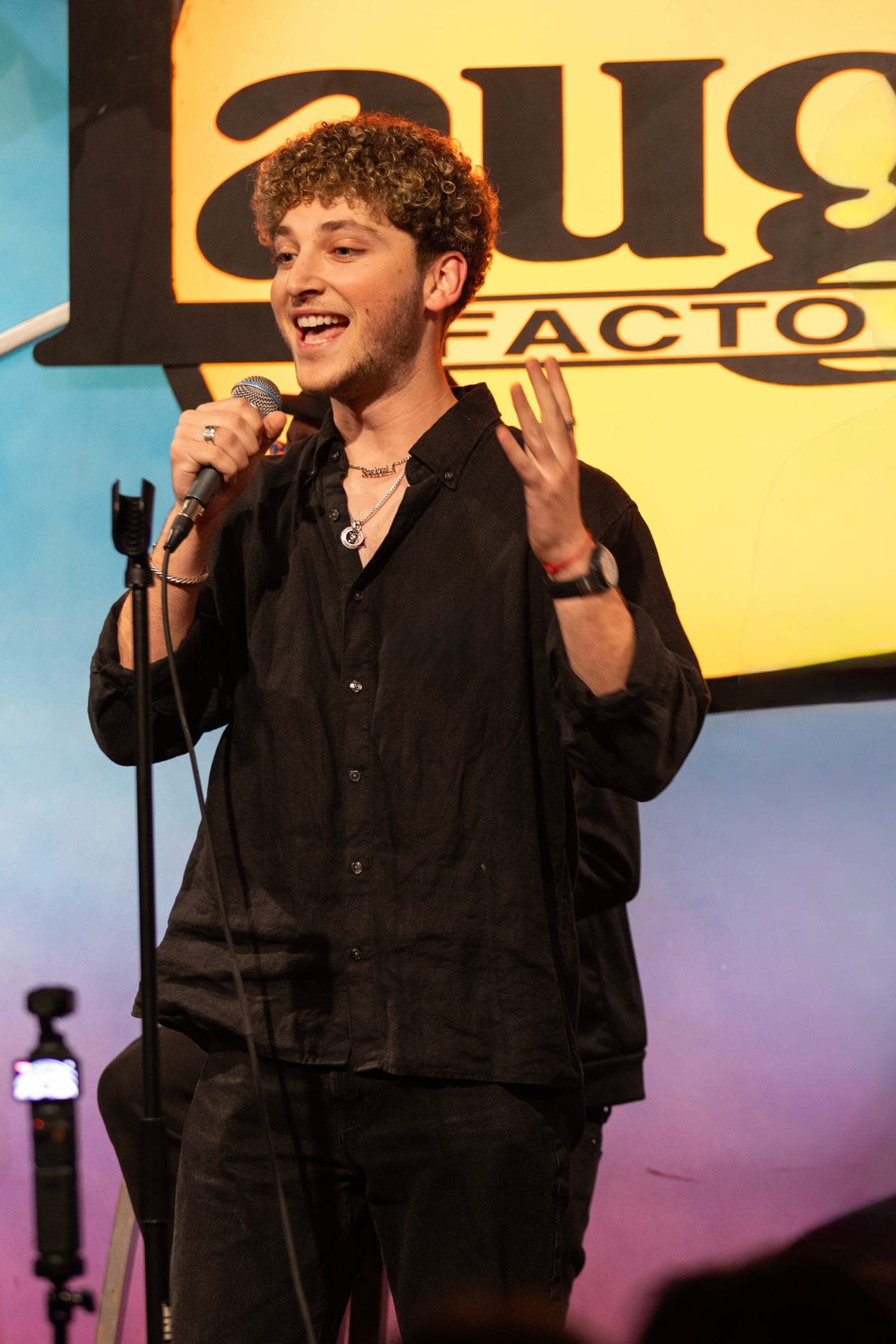 Josh doing stand-up at the Laugh Factory